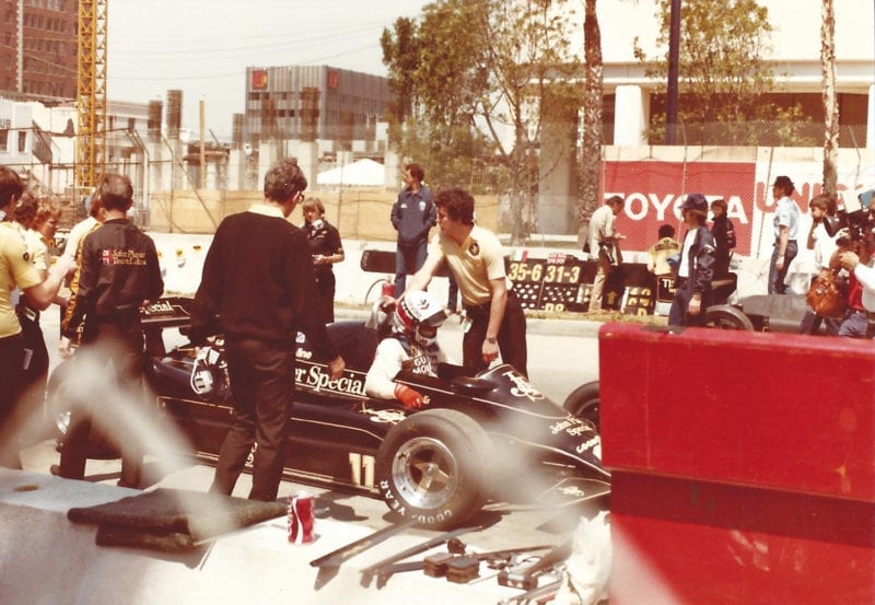 Elio de Angelis gets into his Lotus for the 1982 US Grand Prix