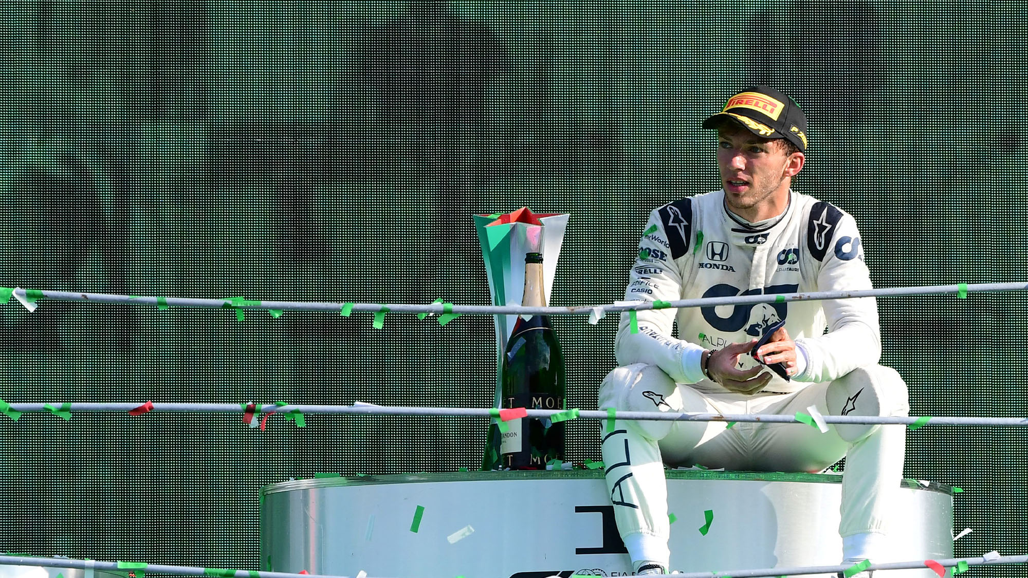 Winner AlphaTauri's French driver Pierre Gasly reacts on the podium after the Italian Formula One Grand Prix at the Autodromo Nazionale circuit in Monza on September 6, 2020. (Photo by JENNIFER LORENZINI / POOL / AFP) (Photo by JENNIFER LORENZINI/POOL/AFP via Getty Images)