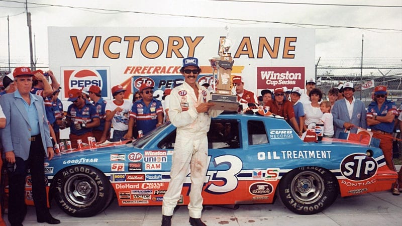 Richard Petty celebrates winning the Firecracker 400 at Daytona in 1984