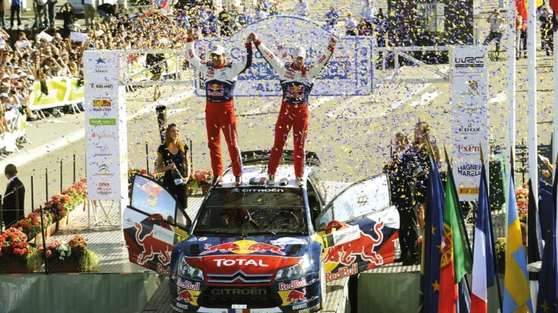 Sebastien Loeb and Daniel Elena celebrate winning the 2010 French Rally