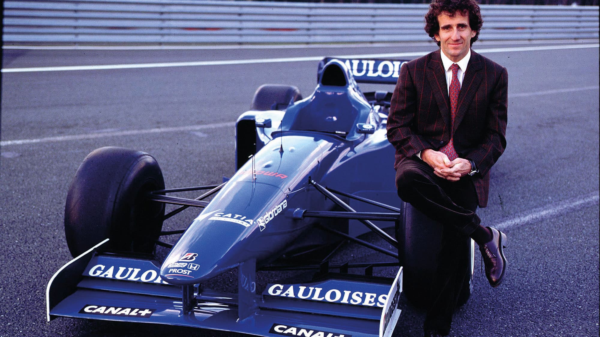 Alain Prost with the Prost JS45 F1 car