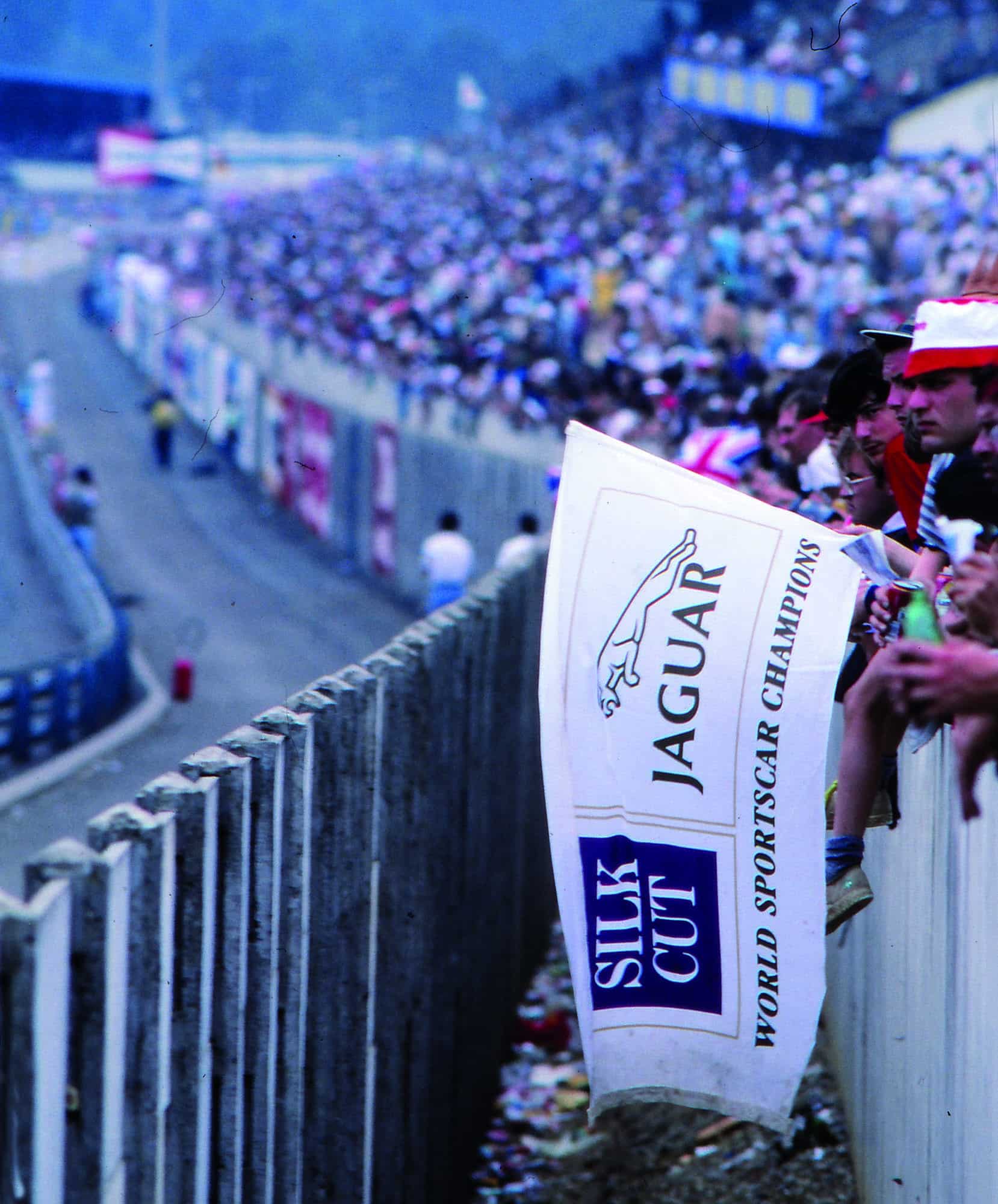 Fans with a Jaguar flag at the 1990 Le Mans 24 Hours