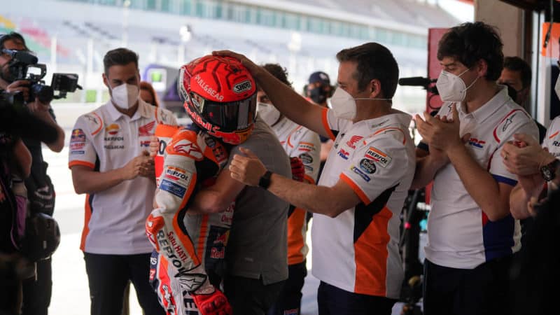 Marc Marquez congratulated by pit crew after the 2021 MotoGP Portuguese GP