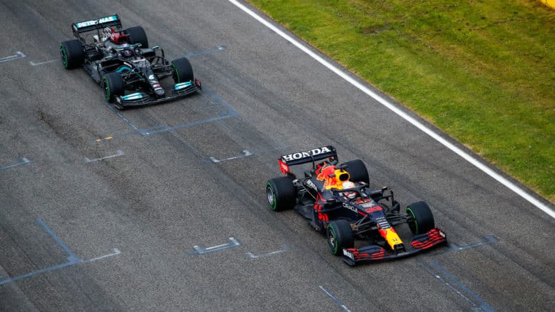 Max Verstappen leads Lewis Hamilton in the 2021 Emilia Romagna Grand Prix