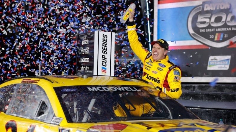 DAYTONA BEACH, FLORIDA - FEBRUARY 14: Michael McDowell, driver of the #34 Love's Travel Stops Ford, celebrates in victory lane after winning the NASCAR Cup Series 63rd Annual Daytona 500 at Daytona International Speedway on February 14, 2021 in Daytona Beach, Florida. (Photo by Jared C. Tilton/Getty Images)