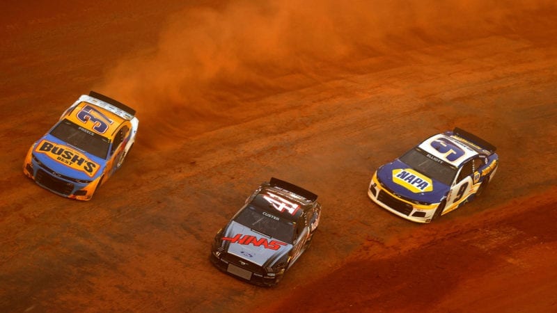 NASCAR Cup racers on the dirt at Bristol Speedway in 2021