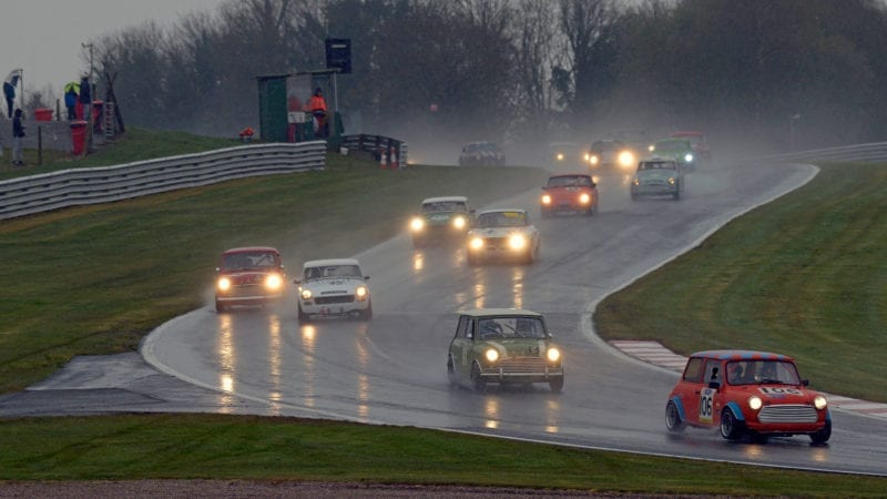 Winner Chris Watkinson leads the field through the Cascades gloom in the opening Swinging Sixties race at Oulton