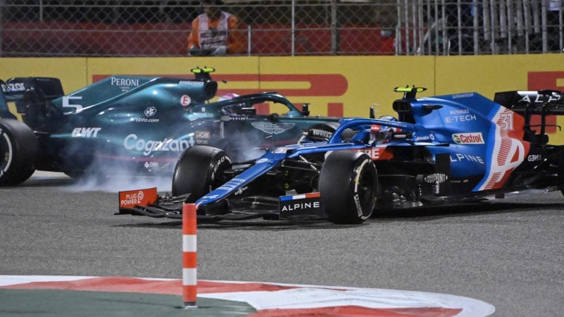 Sebastian Vettel crashes into Esteban Ocon at the 2021 Bahrain Grand Prix