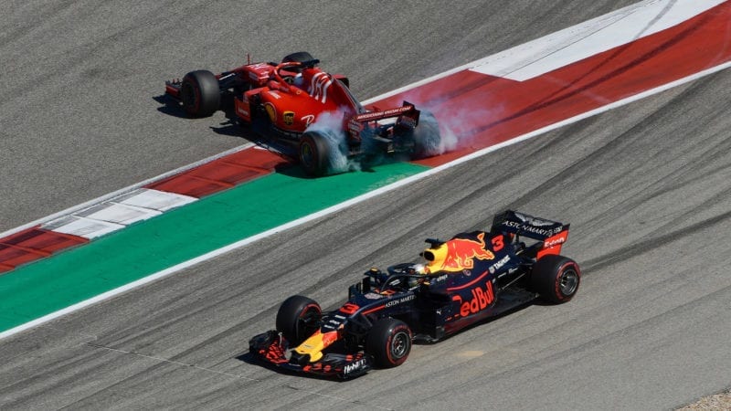 Sebastian Vettel spins after hitting Daniel Ricciardo at the 2018 United States Grand Prix