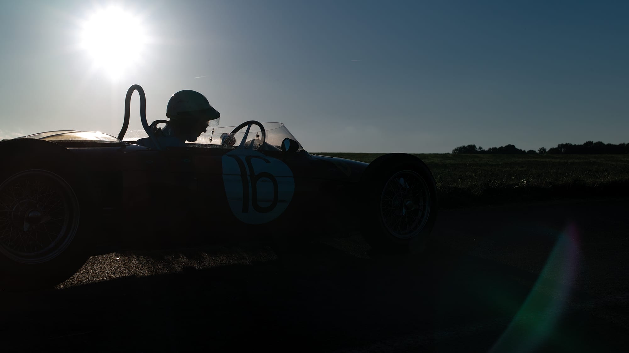 Silhouette of Derek Hill in Sharknose Ferrari