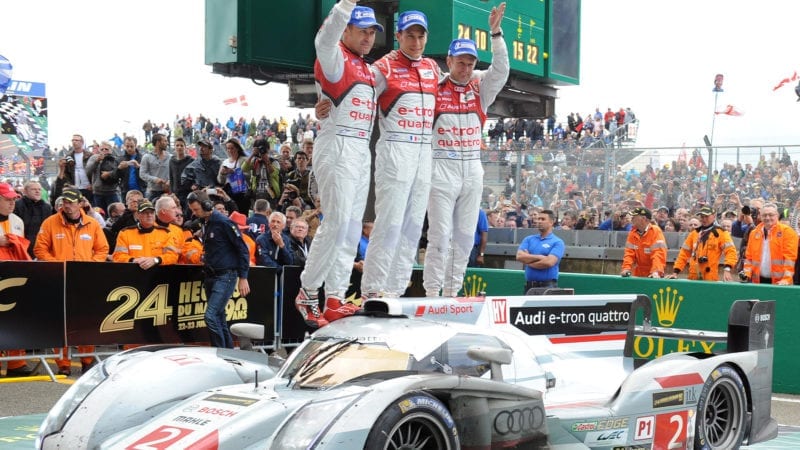 Tom Kristensen Loic Duval and Allan McNish celebrate winning the 2013 Le Mans 24 Hours