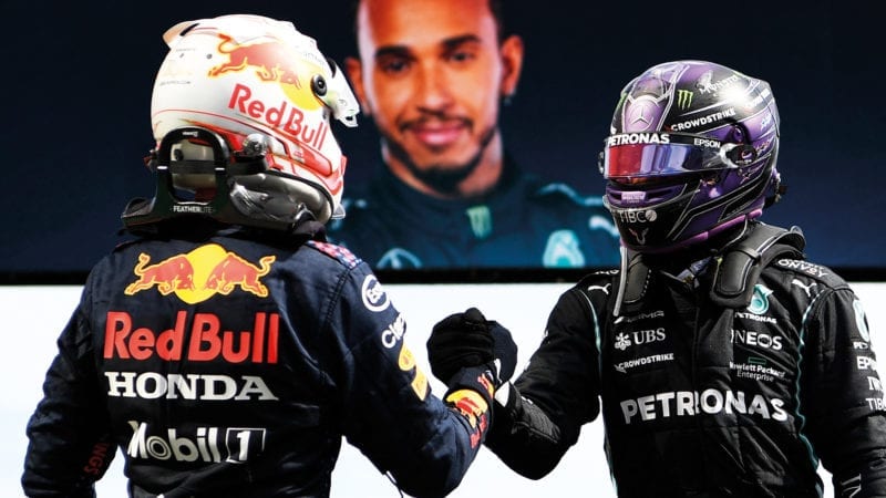 Lewis Hamilton and Max Verstappen shake hands after the 2021 F1 Portuguese Grand Prix