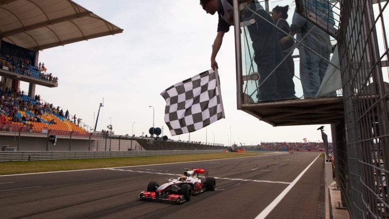 Lewis Hamilton crosses the line to win the 2010 Turkish Grand Prix