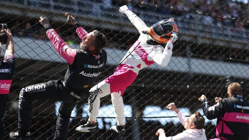 Castroneves climbs fence after winning Indy 500