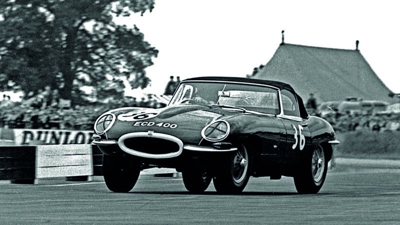 Graham Hill at Silverstone in a Jaguar E-type
