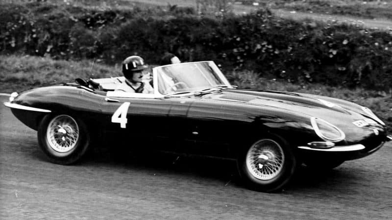 Graham Hill races to victory in a Jaguar E-type