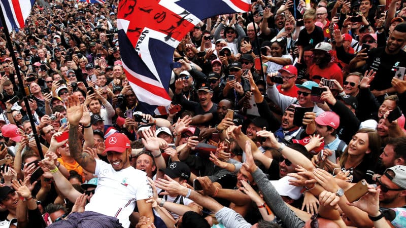 Lewis Hamilton celebrates British GP win with fans in 2019