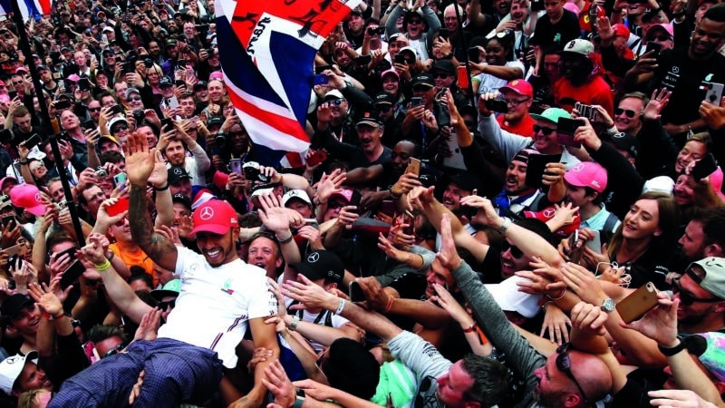 Lewis-Hamilton-crowd-surfing-at-Silverstone
