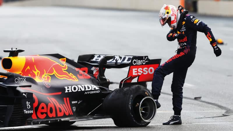 Max Verstappen kicks the tyre of his Red Bull after crashing out of the 2021 Azerbaijan Grand Prix