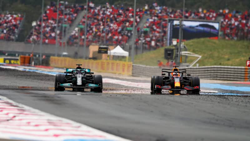 Max Verstappen passes Lewis Hamilton in the 2021 French Grand Prix