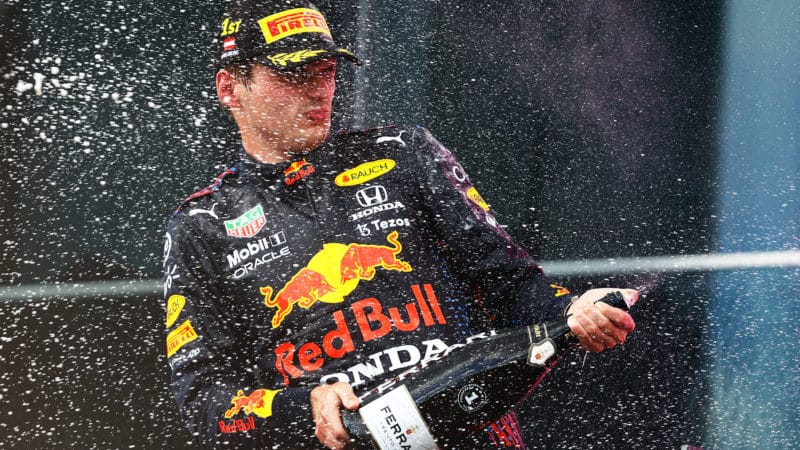 Max Verstappen spray champagne after winning the 2021 Styrian Grand Prix
