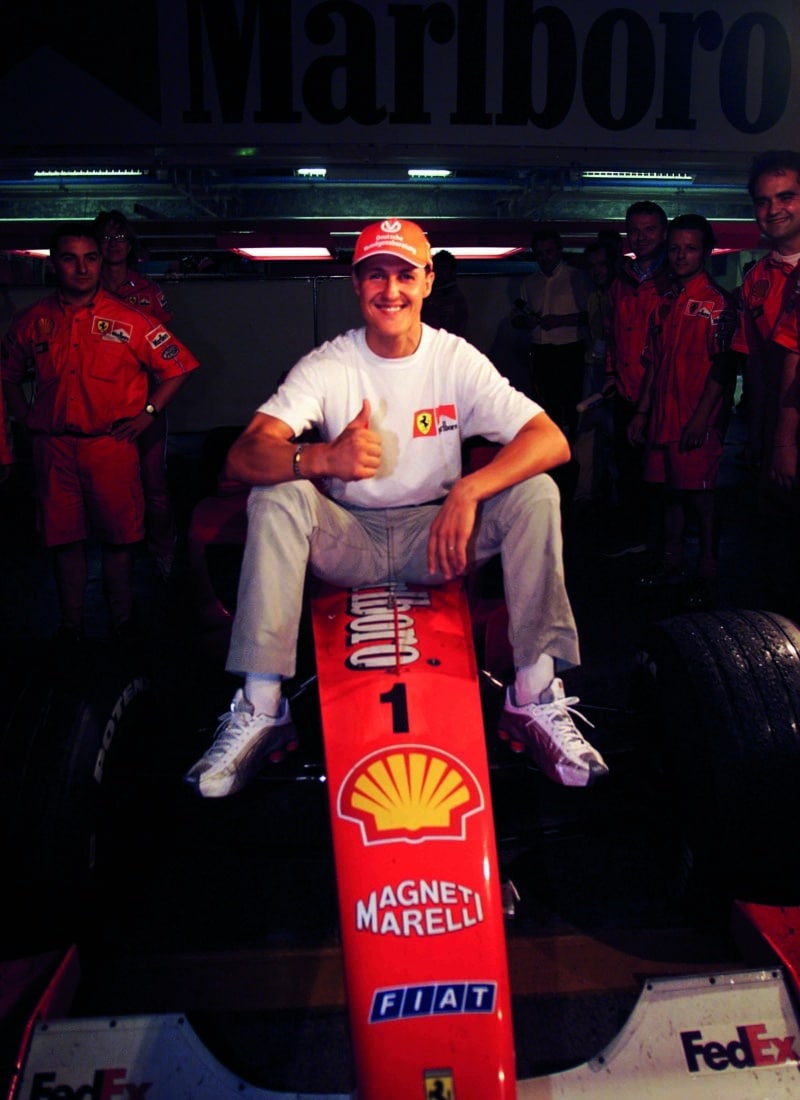 Michael-Schumacher-celebrates-winning-the-F1-championship-at-the-2000-Japanese-Grand-Prix