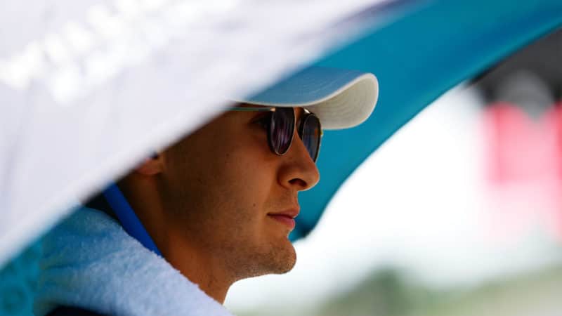 SPIELBERG, AUSTRIA - JUNE 27: George Russell of Great Britain and Williams looks on from the grid ahead of the F1 Grand Prix of Styria at Red Bull Ring on June 27, 2021 in Spielberg, Austria. (Photo by Mario Renzi - Formula 1/Formula 1 via Getty Images)