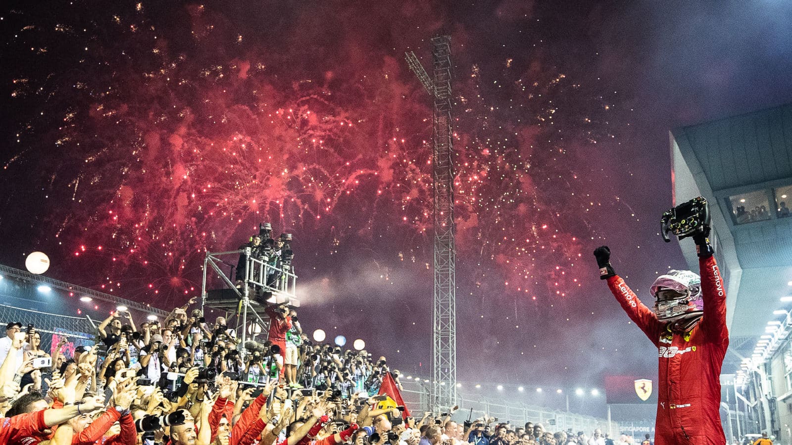 Sebastian Vettel celebrates victory in the 2019 Singapore GP with fireworks