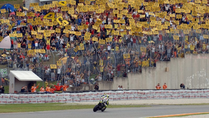Valentino Rossi celebrates victory in front of a home crowd at the 2007 MotoGP Italian Grand Prix