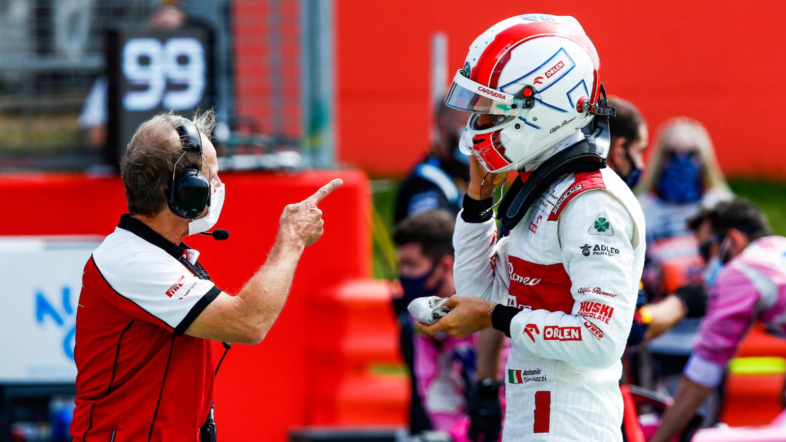 Engineer pointing at Antonio Giovinazzi at Silverstone in 2020