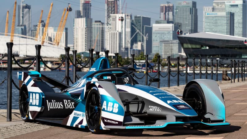 Formula E car in front of the London skyline