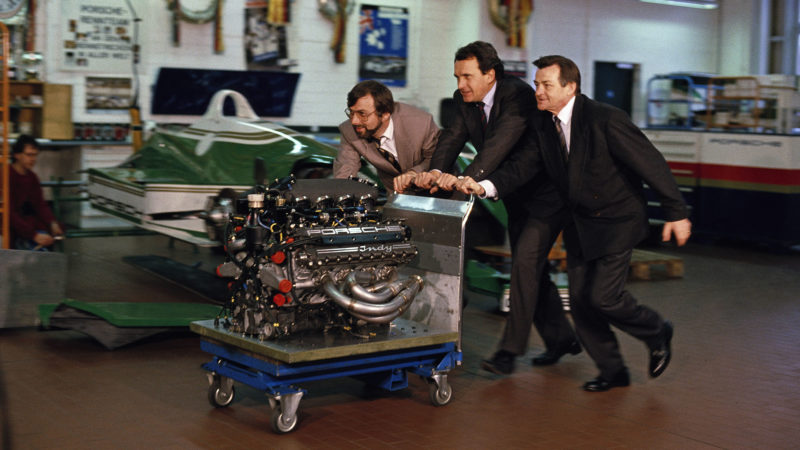 Hans-Joachim Esch, Helmut Flegl, Hans Mezger with Porsche 1990 Indycar engine