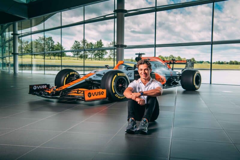 LKando Norris sitting ion front of McLaren