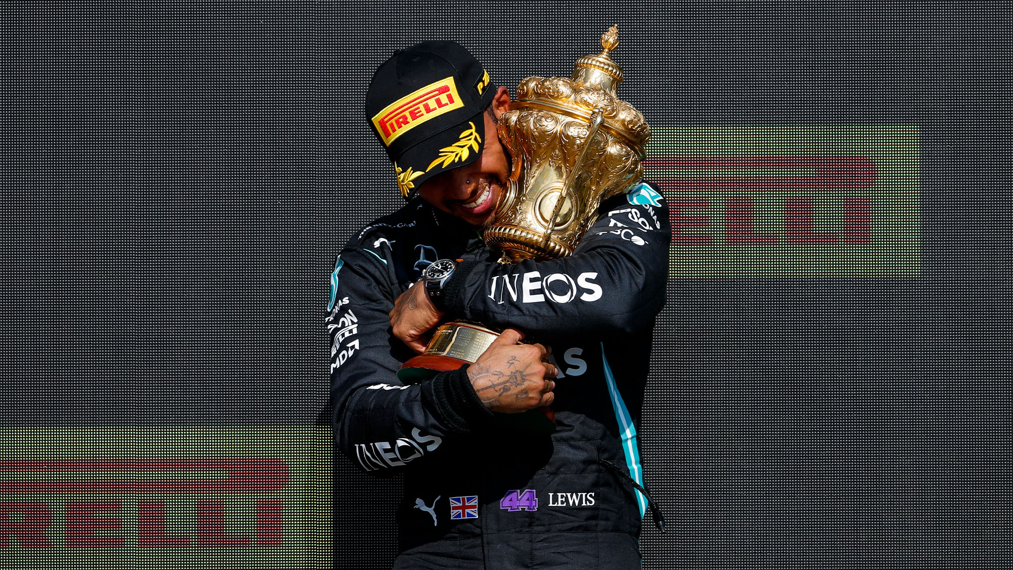 Winner Mercedes' British driver Lewis Hamilton with the trophy on the  News Photo - Getty Images