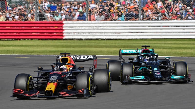 Max Verstappen and Lewis Hamilton battle during the 2021 British Grand Prix sprint race