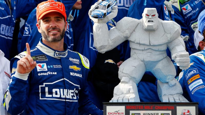 DOVER, DE - JUNE 04: Jimmie Johnson, driver of the #48 Lowe's Chevrolet, celebrates in Victory Lane after winning the Monster Energy NASCAR Cup Series AAA 400 Drive for Autism at Dover International Speedway on June 4, 2017 in Dover, Delaware. (Photo by Jonathan Ferrey/Getty Images)