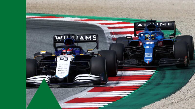 SPIELBERG, AUSTRIA - JULY 04: George Russell of Great Britain driving the (63) Williams Racing FW43B Mercedes leads Fernando Alonso of Spain driving the (14) Alpine A521 Renault during the F1 Grand Prix of Austria at Red Bull Ring on July 04, 2021 in Spielberg, Austria. (Photo by Clive Mason - Formula 1/Formula 1 via Getty Images)