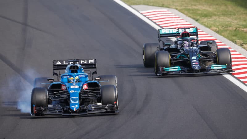 14 ALONSO Fernando (spa), Alpine F1 A521, 44 HAMILTON Lewis (gbr), Mercedes AMG F1 GP W12 E Performance, action during the Formula 1 Magyar Nagydij 2021, Hungarian Grand Prix, 11th round of the 2021 FIA Formula One World Championship from July 30 to August 1, 2021 on the Hungaroring, in Mogyorod, near Budapest, Hungary - Photo Antonin Vincent / DPPI
