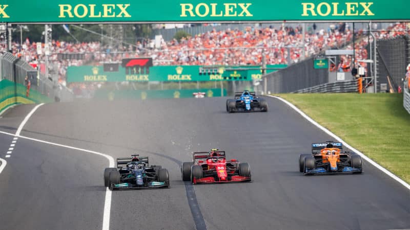 44 HAMILTON Lewis (gbr), Mercedes AMG F1 GP W12 E Performance, overtakes 55 SAINZ Carlos (spa), Scuderia Ferrari SF21, action during the Formula 1 Magyar Nagydij 2021, Hungarian Grand Prix, 11th round of the 2021 FIA Formula One World Championship from July 30 to August 1, 2021 on the Hungaroring, in Mogyorod, near Budapest, Hungary - Photo Antonin Vincent / DPPI