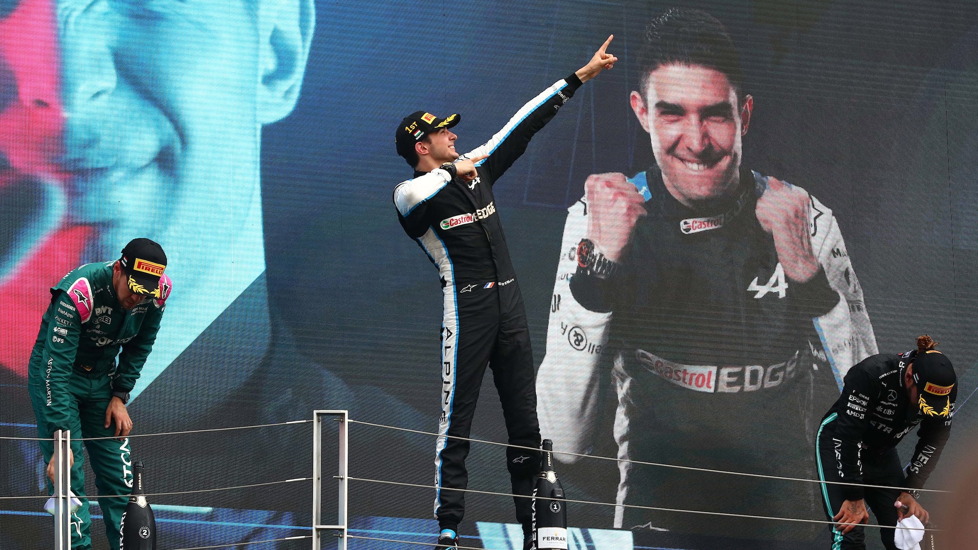 Esteban Ocon on the podium after winning the 2021 Hungarian Grand Prix