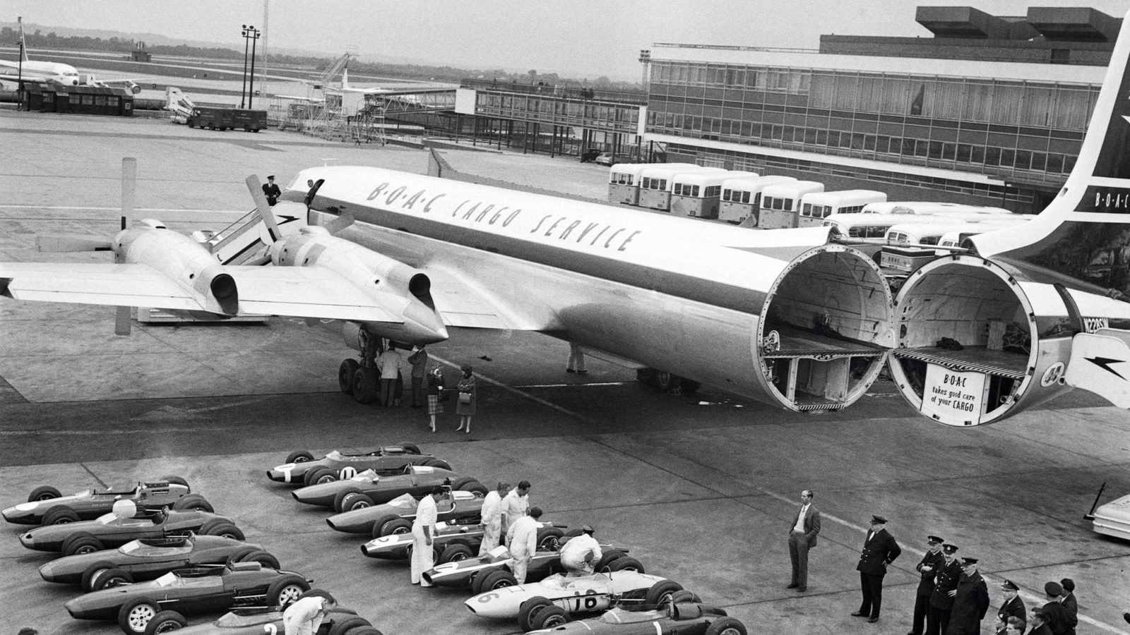 F1 cars wait to be loaded on a plane to the 1963 Watkins Glen race