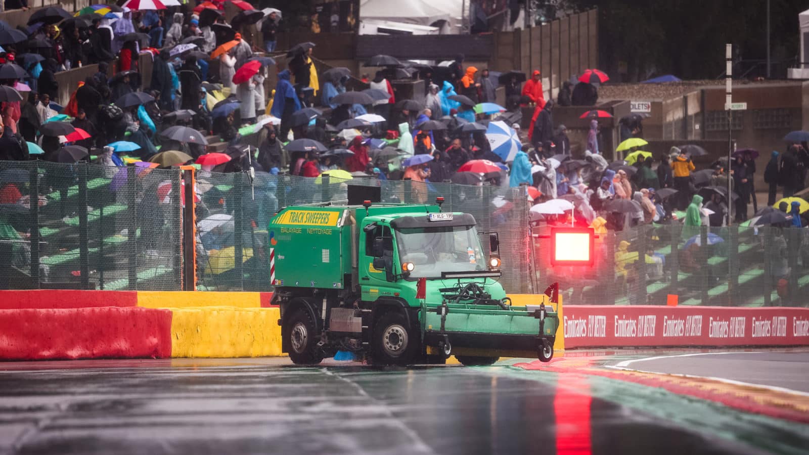 Green sweeper truck at Spa during the 2021 Belgian Grand Prix