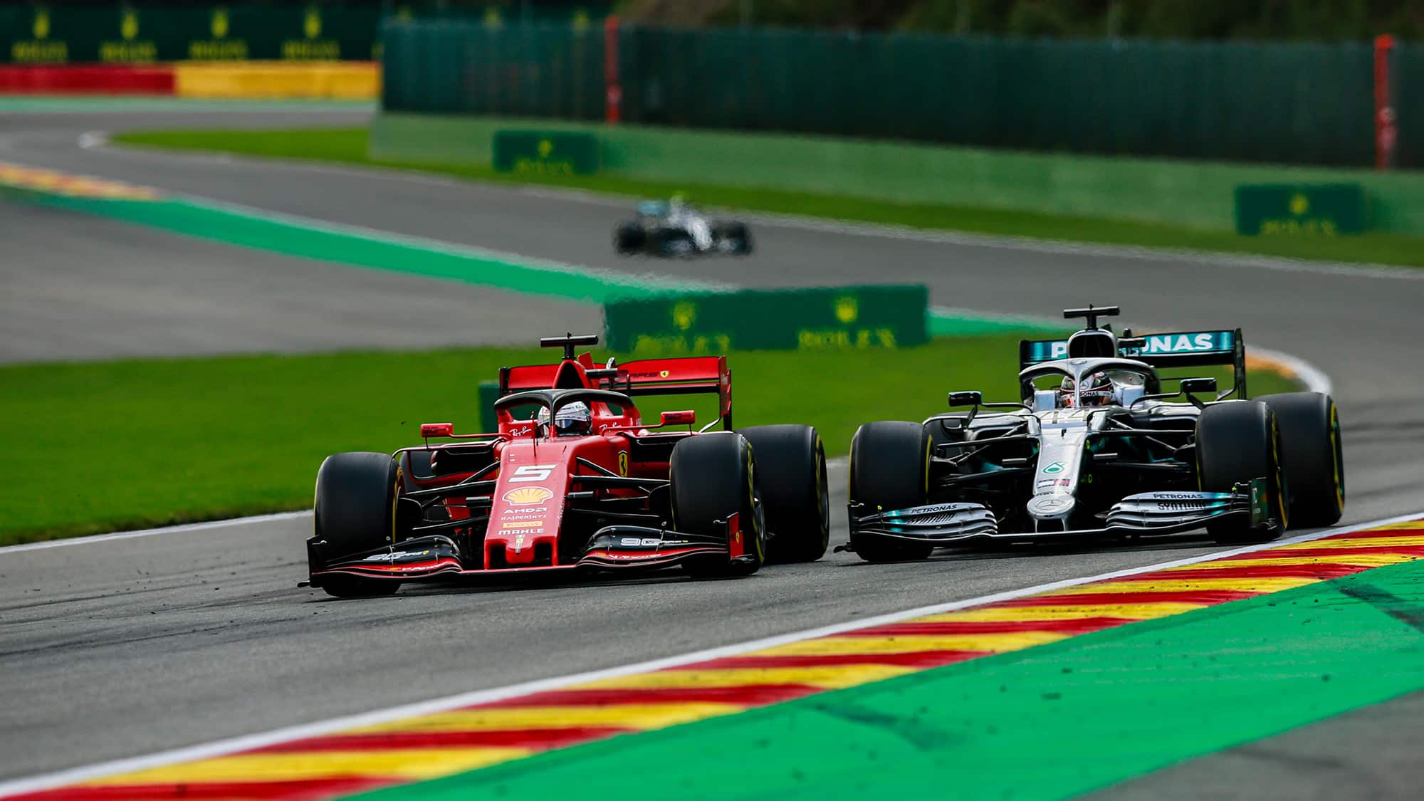 Lewis Hamilton and Sebastian Vettel battle at the 2019 Belgian Grand Prix