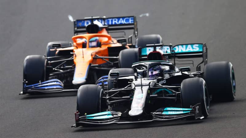 Lewis Hamilton overtakes Daniel Ricciardo at the 2021 Hungarian Grand Prix