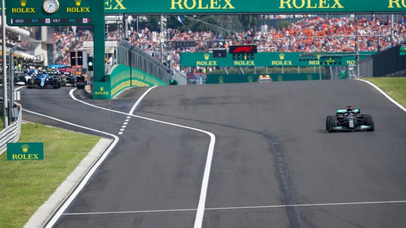 Lewis Hamilton takes the restart of the 2021 Hungarian Grand Prix