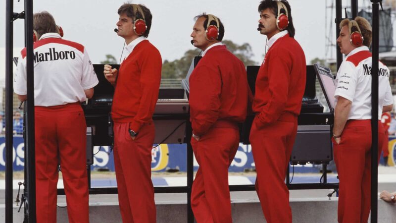 Team principle for Honda Marlboro McLaren Ron Dennis stands in between team designers Steve Nichols (L) and Gordon Murray (R)and Neil Oatley (far right) during the Foster's Australian Grand Prix on 5th November 1989 on the streets of Adelaide in Adelaide, Australia. (Photo by Pascal Rondeau/Getty Images)