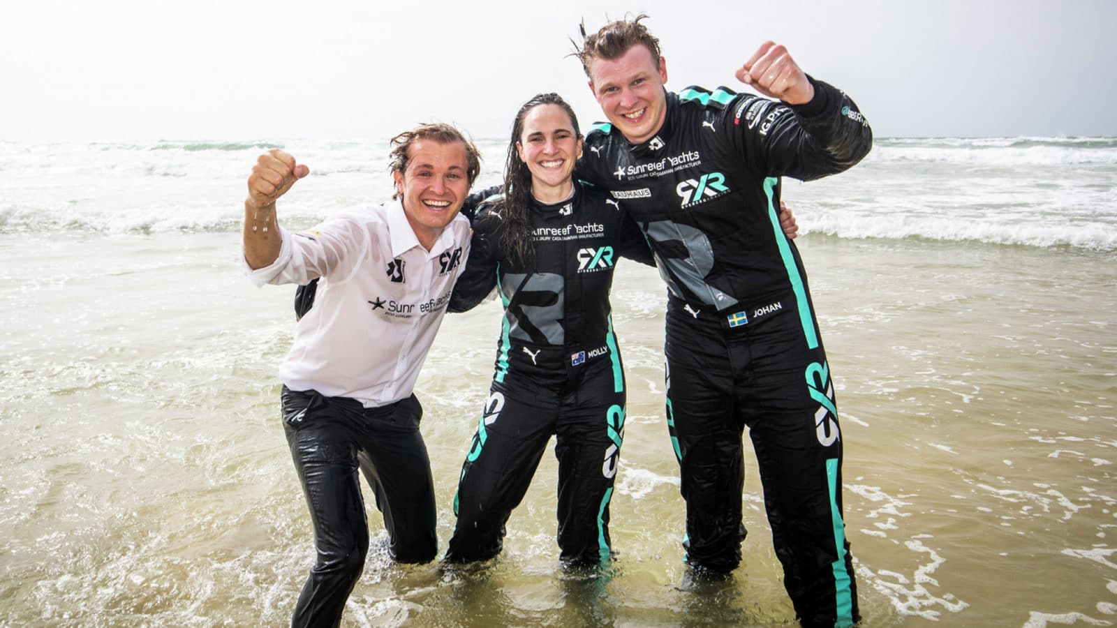 Nico Rosberg celebrates Extreme E win with molly Taylor and Johann Kristoffersson