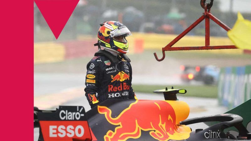 Red Bull's Mexican driver Sergio Perez exits his car after crashing in a warm up run before the Formula One Belgian Grand Prix at the Spa-Francorchamps circuit in Spa on August 29, 2021. (Photo by Kenzo Tribouillard / AFP) (Photo by KENZO TRIBOUILLARD/AFP via Getty Images)