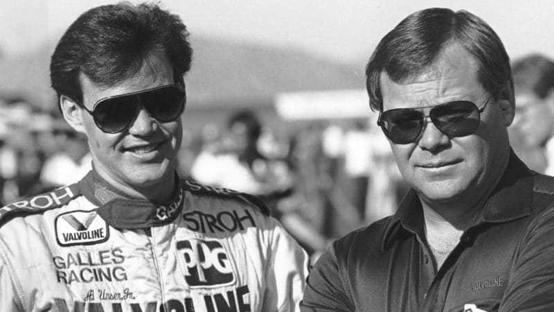 Car Owner Rick Galles talks with his driver Al Unser, Jr. at a race in the early 1980s. The pair teamed to win the SCCA Can-Am championship in 1982 before moving their effort to Indy Car racing. They were together for the 1983 and 1984 seasons, then again from 1988 through 1993, scoring a total of 16 victories including the 1992 Indianapolis 500. The two were together yet again in the Indy Racing League in 2000 and 2001, taking two more wins during the period. (Photo by ISC Images & Archives via Getty Images)