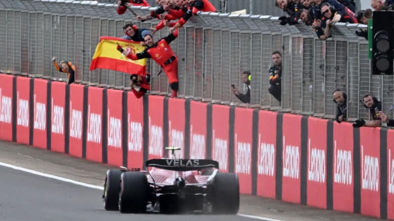 Carlos Sainz crosses the finish line for his debut win at the 2022 British Grand Prix